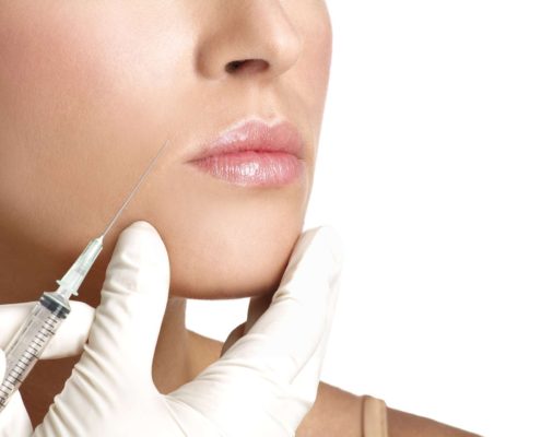 beauty woman close up injecting cosmetic treatment