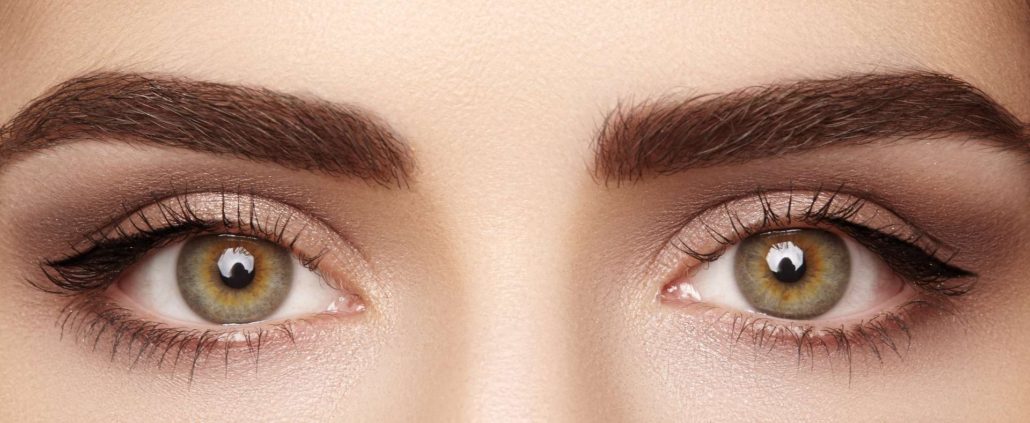 Close-up macro of beautiful female eye with perfect shape eyebrows. Clean skin, fashion naturel make-up. Good vision Close-up macro of beautiful female eye with perfect shape eyebrows. Clean skin, fashion naturel make-up. Good vision